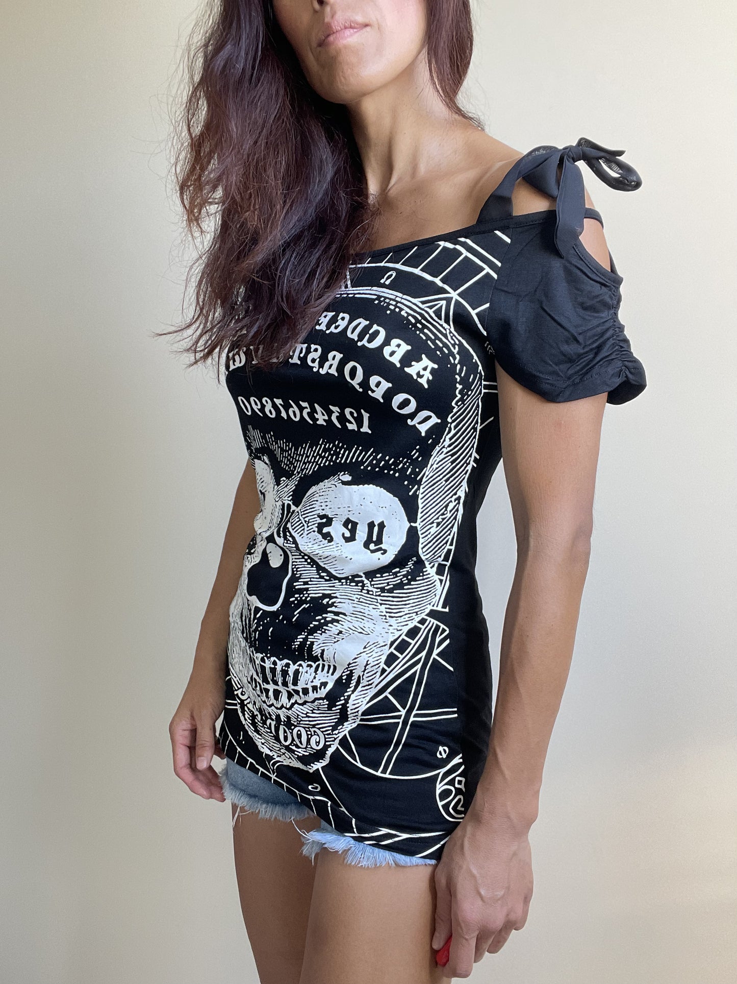 Banned Apparel Skull and Ouija Board cgraphic Print Skull Face Cut Out Open Shoulder Top