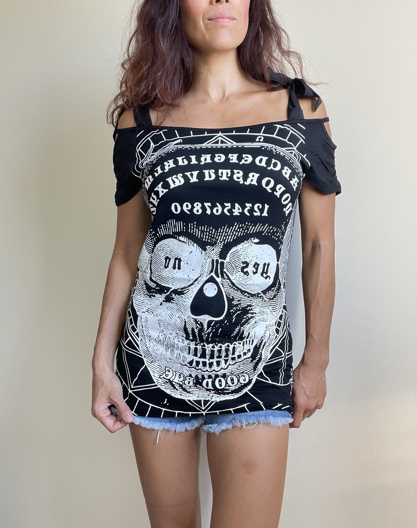 Banned Apparel Skull and Ouija Board cgraphic Print Skull Face Cut Out Open Shoulder Top