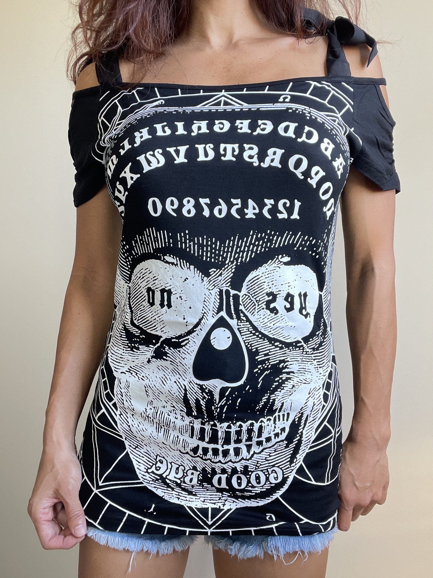 Banned Apparel Skull and Ouija Board cgraphic Print Skull Face Cut Out Open Shoulder Top